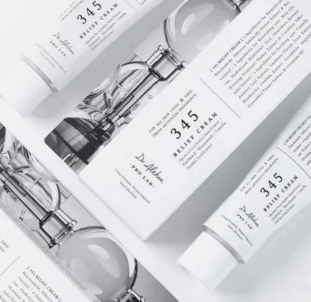 Flat lay of multiple Dr. Althea 345 Relief Cream products, showcasing the sleek design and the focus on each cream's skincare benefits.