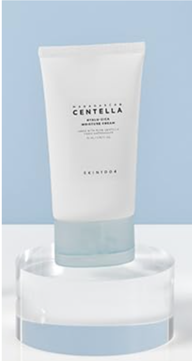 Skin1004 Madagascar Centella Water-Fit Sun Serum displayed elegantly against a pastel blue background, accentuating its premium formulation rich in Centella Asiatica.