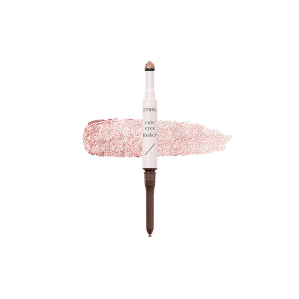 Etude Cute Eyes Marker - A dual-ended eye contour tool featuring a glitter tip and a slim liner, elegantly positioned over a shimmering rose gold swatch, perfect for creating versatile eye makeup looks.