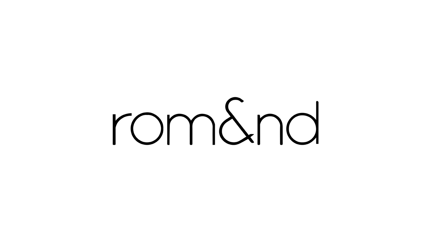 a black and white photo of the word rom and d