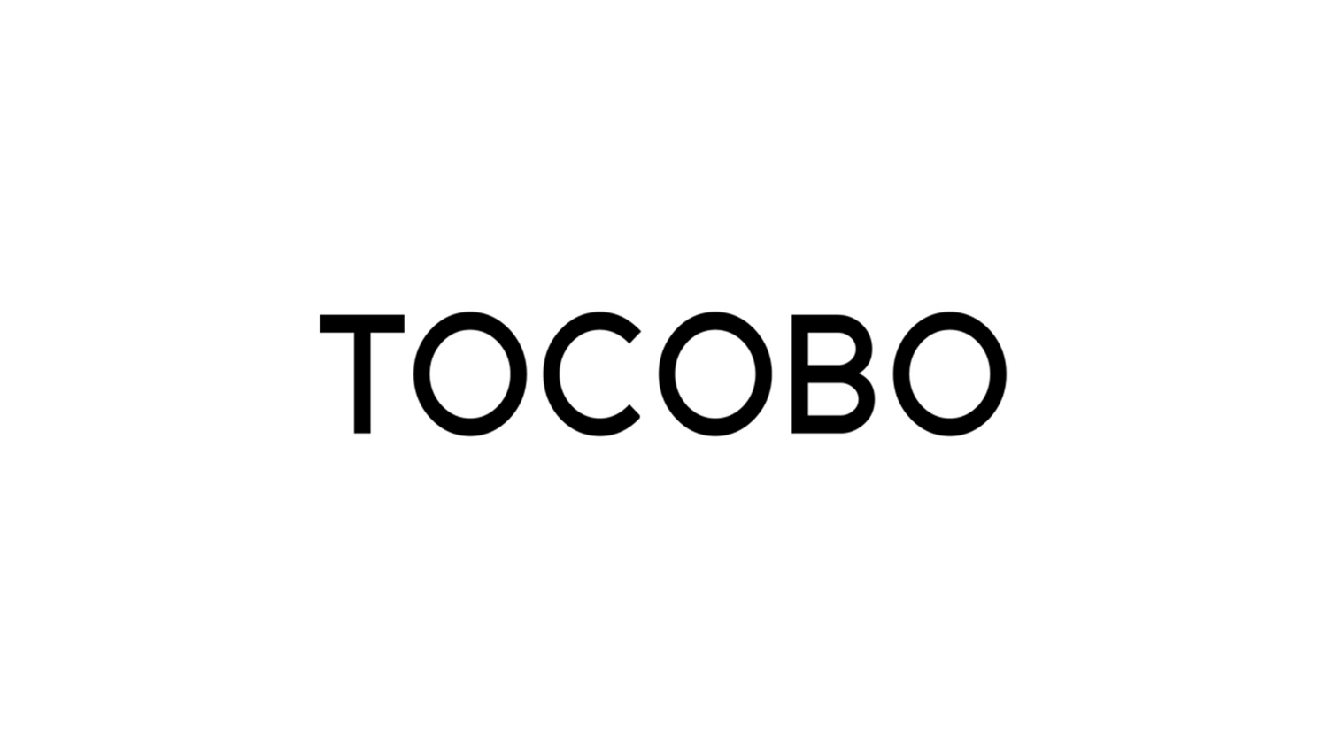 a black and white photo of the word tocobo