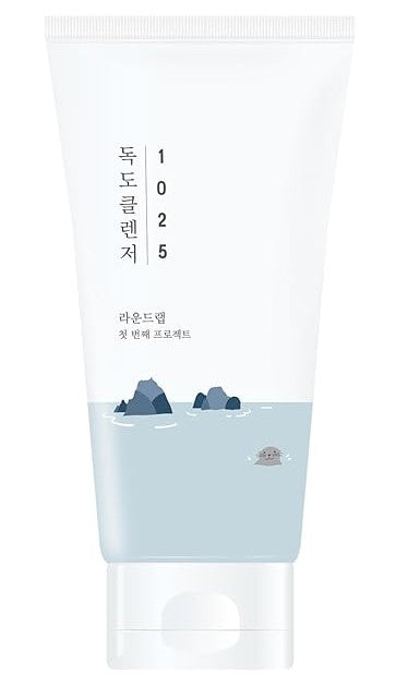 Round Lab 1025 Dokdo Cleanser product image featuring a clear design with blue and white tones, and imagery suggesting a soothing effect.