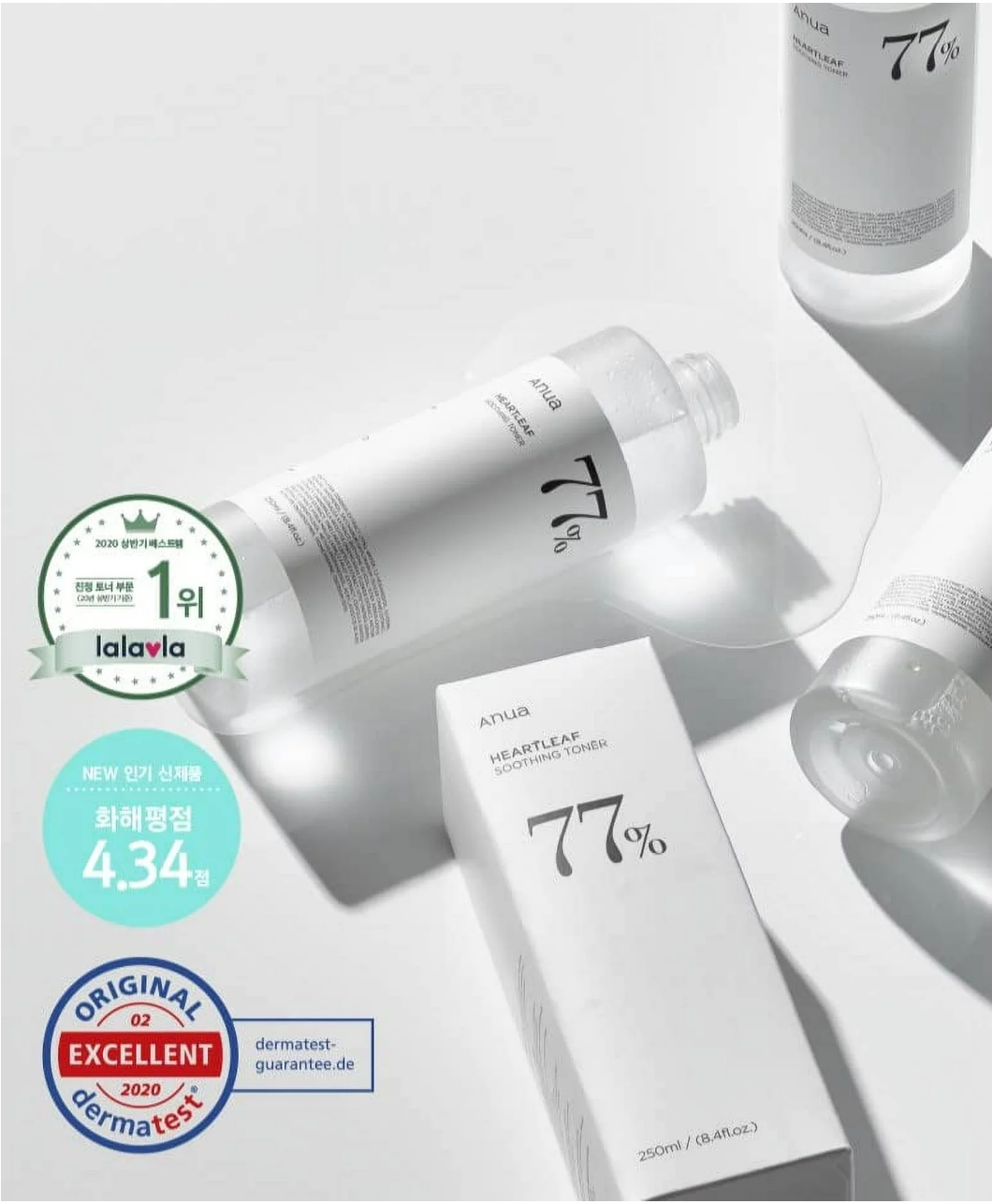 a group of three bottles of lotion sitting on top of a table