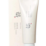 a tube of cream sitting next to a box