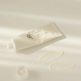 a tube of cream sitting on top of a table