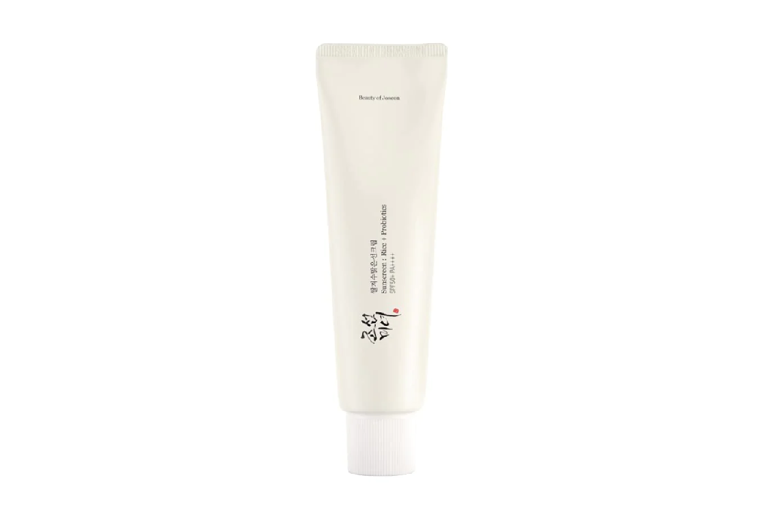 a tube of white cream on a white background