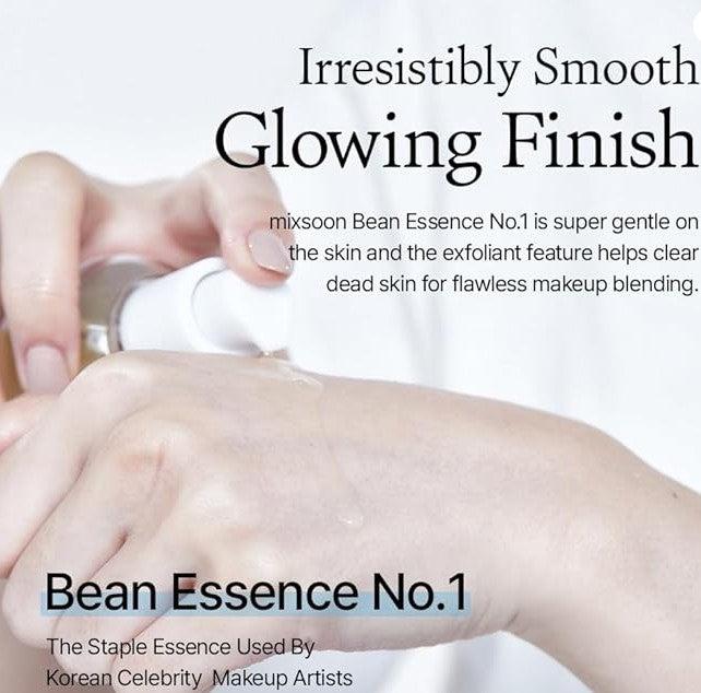 A close-up shot of a hand applying Mixsoon Bean Essence to skin, illustrating its smooth application and glowing finish—truly a skin savior!