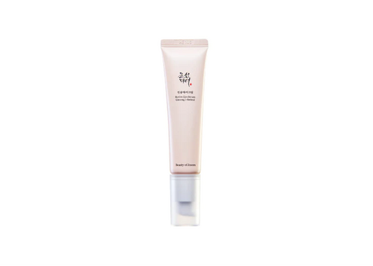 a tube of cream sitting on top of a white surface