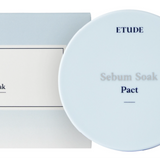 a white plate sitting next to a white box