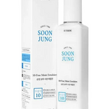 a bottle of soap sitting next to a box