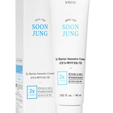 a tube of toothpaste next to a box of toothpaste