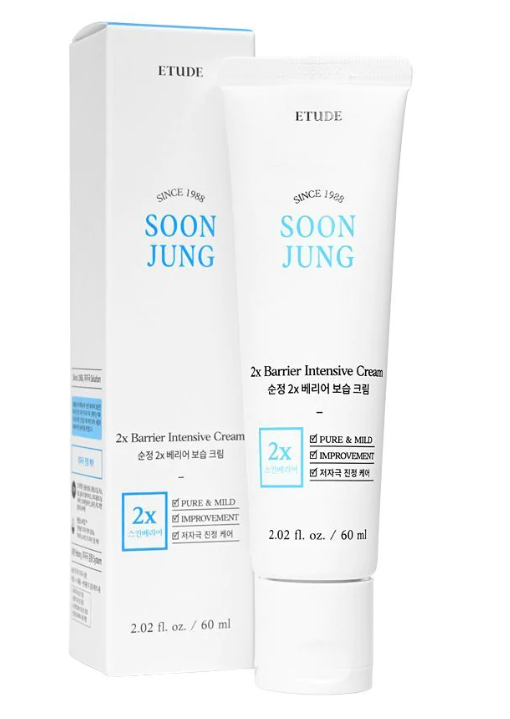 a tube of toothpaste next to a box of toothpaste