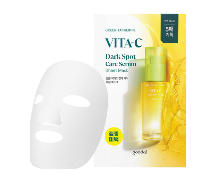 a white mask next to a box of vitamin - rich facial care