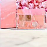 The rom&nd Bare Layer Mood Palette elegantly displayed with a charming pink background, showcasing its gorgeous shades for versatile looks.