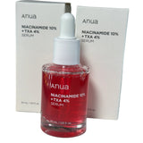 a bottle of niacinamide 10 % in front of a box