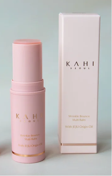 Kahi Wrinkle Bounce Multi Balm displayed alongside its elegant packaging. The perfect combo for keeping those wrinkles at bay!