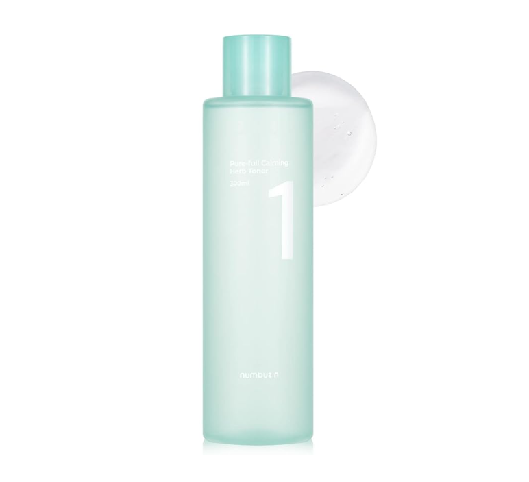 Numbuzin Pure Full Calming Herb Toner bottle elegantly displayed with a splash of toner beside it, promising hydration and soothing properties for sensitive skin.