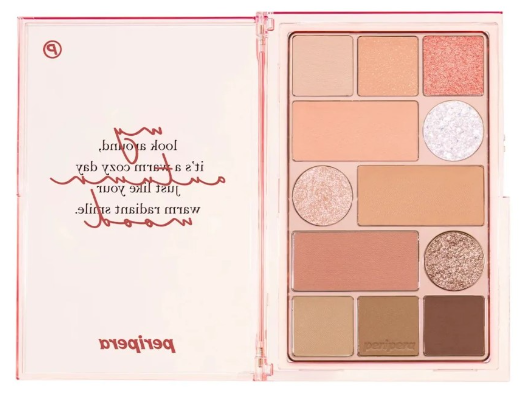 Open view of Peripera's 'My Autumn Mood' palette, displaying alluring coral and brown shades with a whimsical message about cozy autumn days.