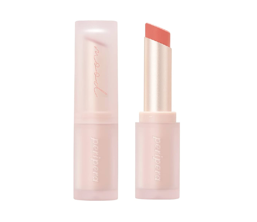 A sleek packaging of Peripera Ink Mood Matte Lipstick showcasing a soft nude shade, ideal for dreamy lips.
