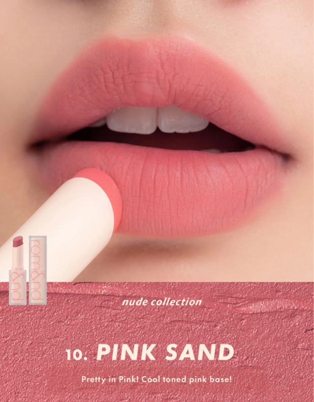 Vibrant view of rom&nd's Zero Matte Lipstick in use, featuring the Pink Sand shade on soft, smooth lips, emphasizing its cool-toned pink base from the nude collection.