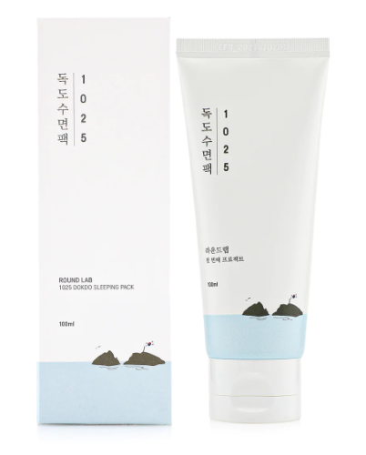 Box and tube of Round Lab 1025 Dokdo Sleeping Pack 100ml showcasing its hydrating features, designed for rejuvenated skin overnight.