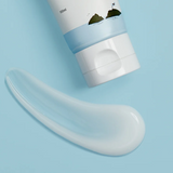 Close-up of Round Lab 1025 Dokdo Sleeping Pack 100ml with a texture sample, highlighting its gel-like consistency for deep hydration.