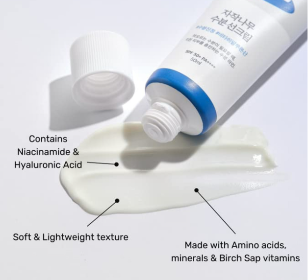 Detailed view of Round Lab Birch Juice Moisturizing Sun Cream SPF 50+, showcasing the texture of the cream and highlighting key ingredients like niacinamide and hyaluronic acid.