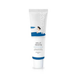 Round Lab Birch Juice Moisturizing Sun Cream SPF 50+ in a stylish tube with an illustration of a woman by birch trees, perfect for daily sun protection.