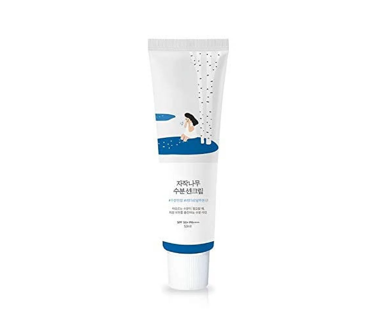 Round Lab Birch Juice Moisturizing Sun Cream SPF 50+ in a stylish tube with an illustration of a woman by birch trees, perfect for daily sun protection.