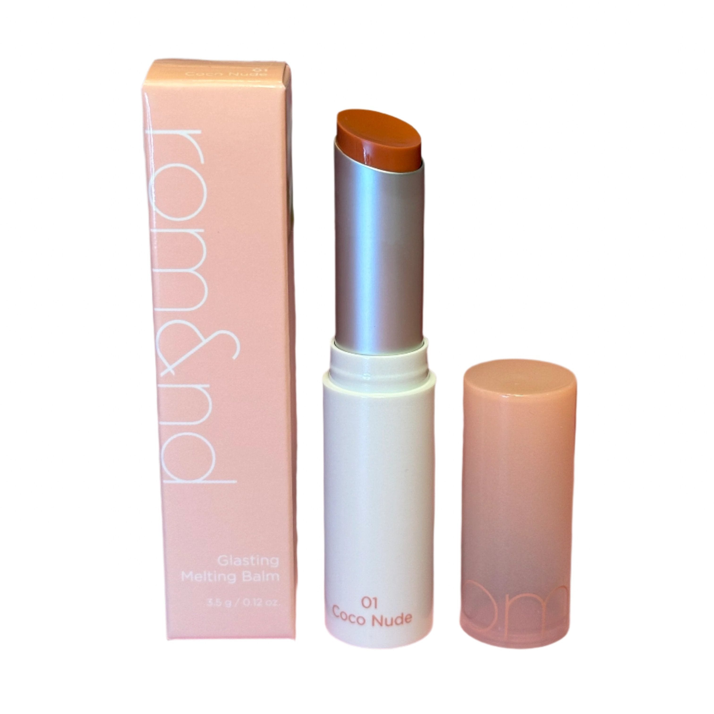 rom&nd Glasting Melting Balm in the shade 01 Coco Nude, displayed with its packaging, showcasing the moisturizing balm tube.