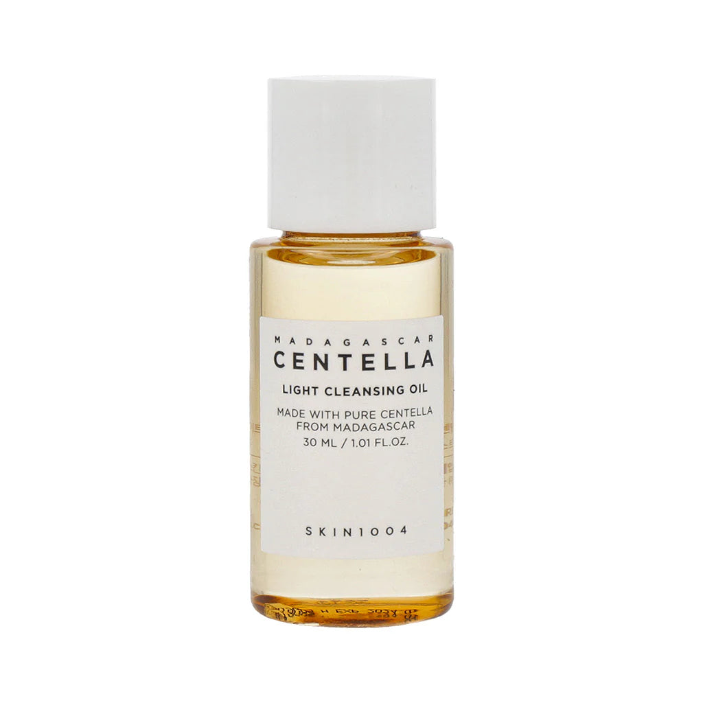 Small bottle of Skin1004 Madagascar Centella Light Cleansing Oil, featuring a minimalistic label, ideal for travel and gentle cleansing.