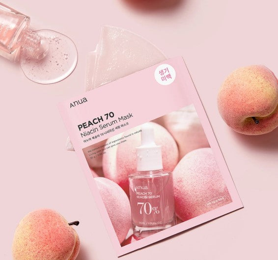 a book with a bottle of nail polish next to some peaches