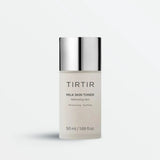 Tirtir Milk Skin Toner in a sleek frosted bottle with silver cap, showcasing its moisturizing and soothing properties for refreshing skin hydration.