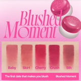 a close up of a lipstick on a pink background