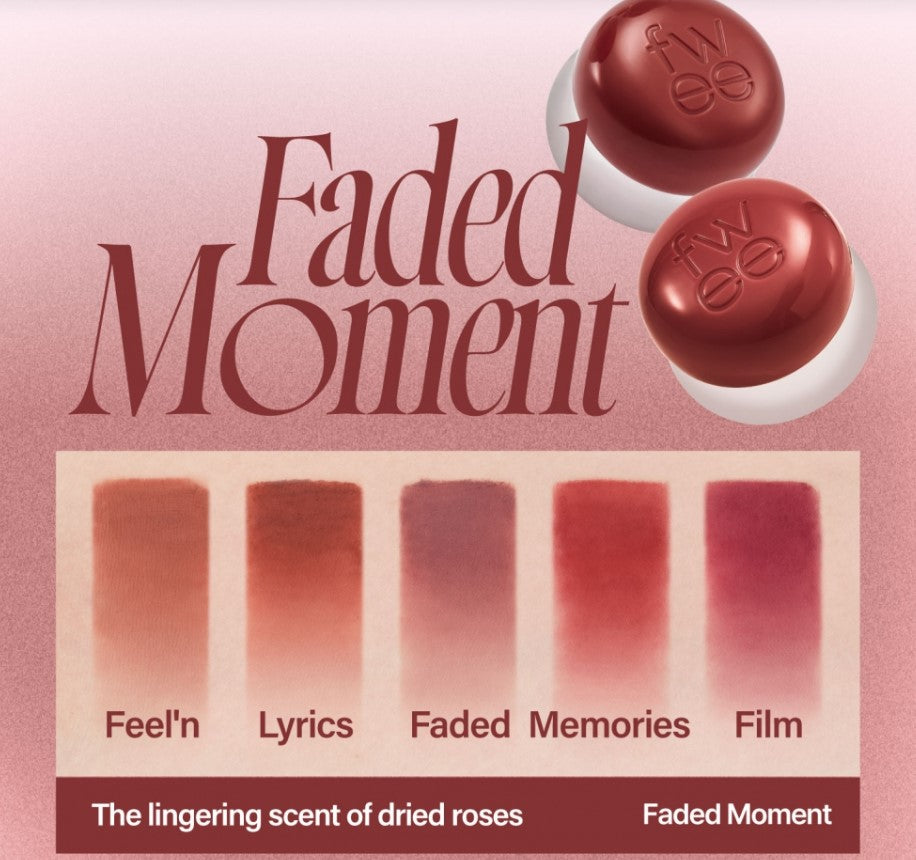 a close up of a lipstick on a pink background