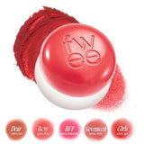 a close up of a red ball of makeup