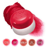 a close up of a red and white object