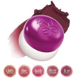 a close up of a ball of makeup on a white background