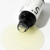 A spill of the Numbuzin No.5 Vitamin Concentrated Serum showcasing its lightweight texture, ideal for a skin-perfecting routine.