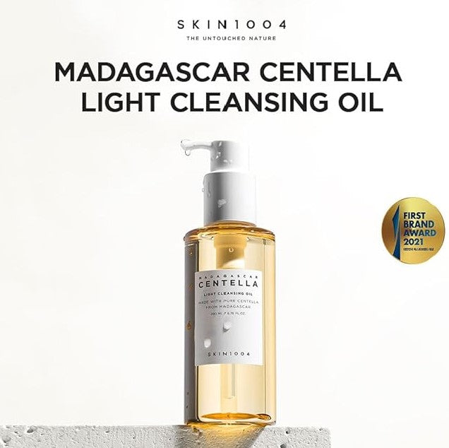Promotional image of Skin1004 Madagascar Centella Light Cleansing Oil highlighting its soothing properties, designed for effective makeup removal.