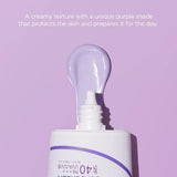 Isntree Onion Newpair Sunscreen SPF40 Pa+++ showcasing its creamy purple texture ready for application, delivering hydration and protection to keep your skin looking youthful and vibrant. Ideal for anti-aging.