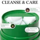 a close up of a green container with tissue