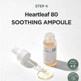 a bottle of liquid with a dropper next to it